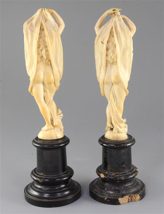 A pair of 19th century Dieppe ivory carvings of muses, Overall H. 12.25in.